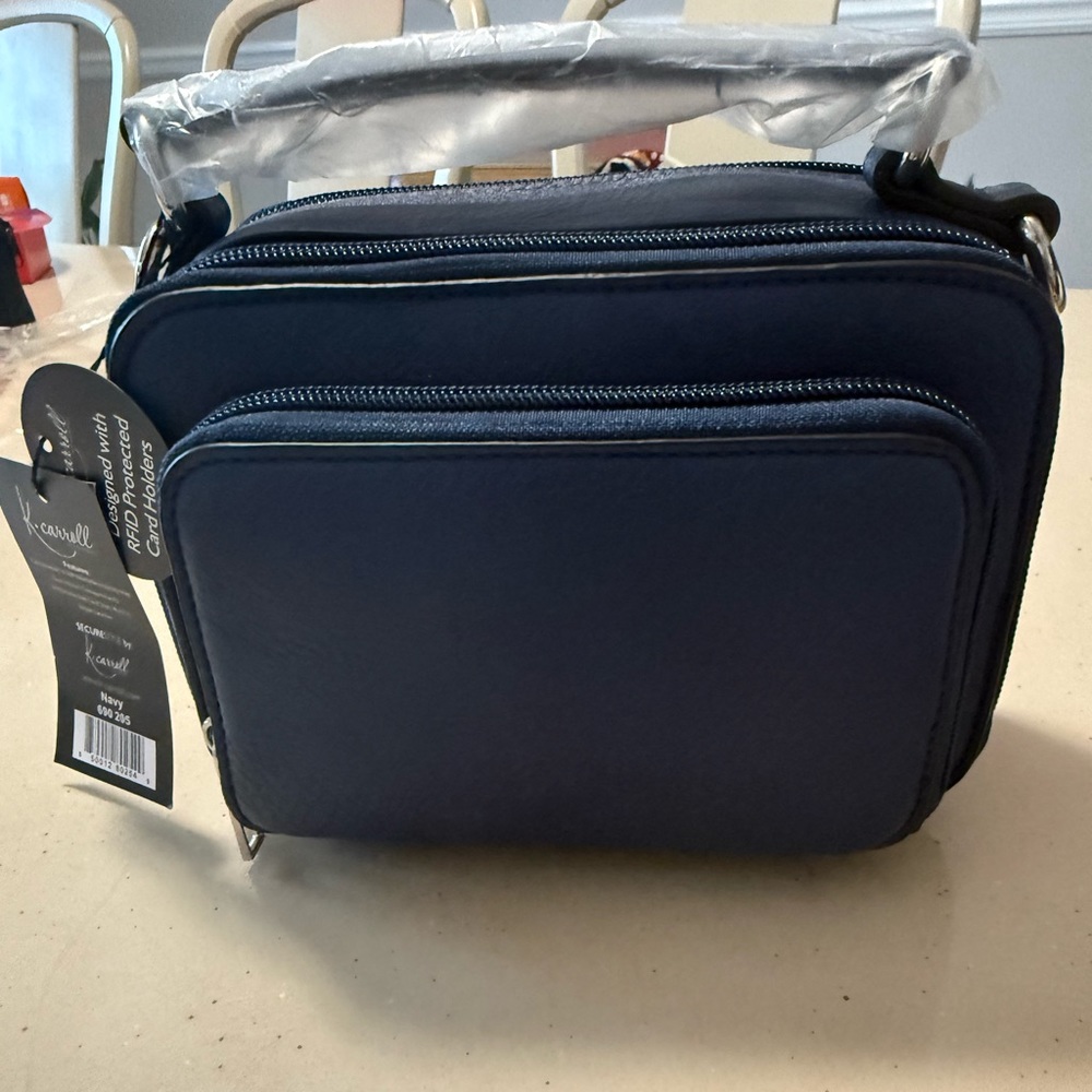 NWT- K. Carroll Accessories Crossbody Bag/Navy. One of Oprah’s Favorite Things!